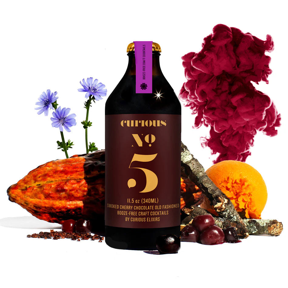 Bottle of Curious Elixirs No. 5 with decorative elements like flowers and fruits on a white background